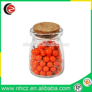 Round Orange Push Pin in Mini Glass Bottle