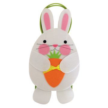 Easter bunny embraces carrot candy gift bag