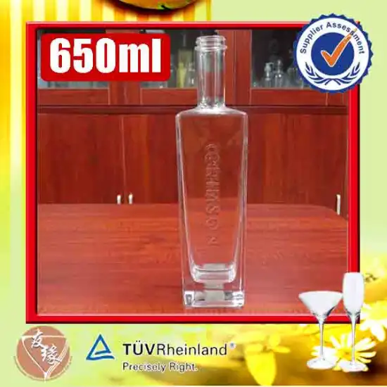 rectangle custom embossed logo high transparent glass 650ml alcohol glass bottle with screw cap