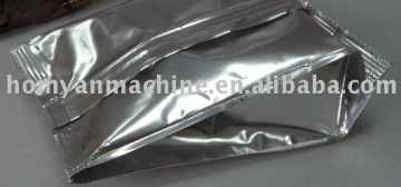 Self--stand pouch packing machine