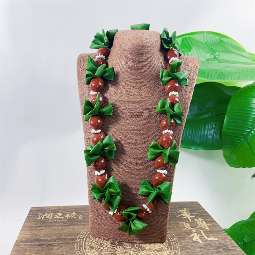 Hand-made Kukui Ti Leaf Mango Shell Lei