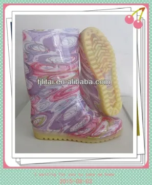 woman zebra pvc rain boots