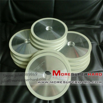 Ceramic diamond grinding wheel for processing natural diamond