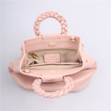 Pink dumpling handbag w/ woven handles