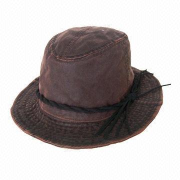 Brown fishing hat, decorated with queue tape