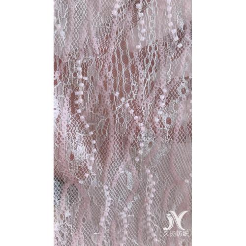 Brudklänningtyg i rosa broderi