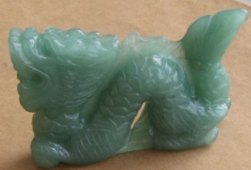 Carved gemstone chinese dragon figurine