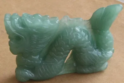 Carved gemstone chinese dragon figurine