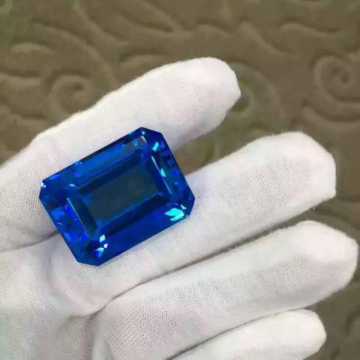 Natural emerald cut london blue topaz stone