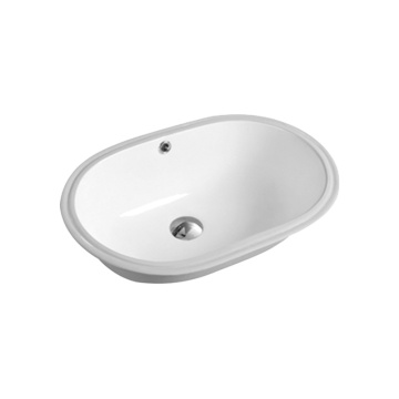 Bianco sotto il lavandino del bacino da bagno per bagno
