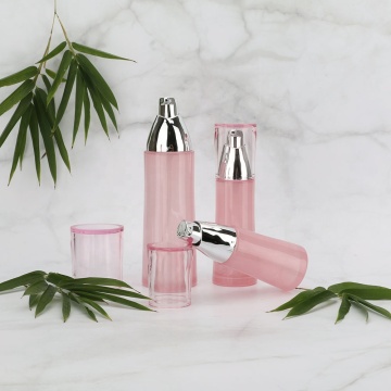 Roze glazen cosmetische pot en fles