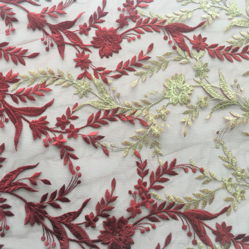 Zweifarbige Symmetrie-Blumenstickerei auf Poly-Netz