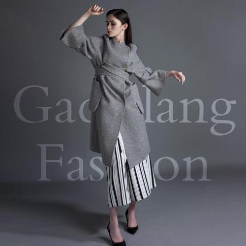 Large pocket double belt style overcoat