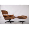 Charles in Ray Eames Lounge Chair in Ottoman