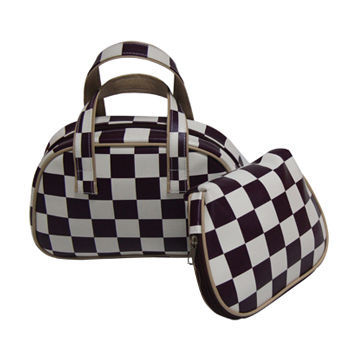 Promotional cosmetic bags, made of PVC,black and white grids,PU trim,with handle,ideal for promotion