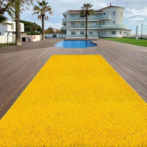 Rumput buatan kuning untuk gym