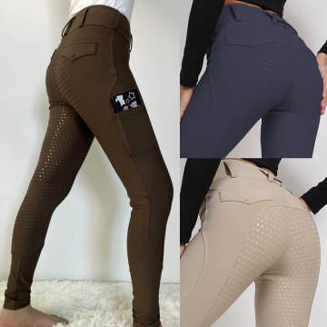 Pantalones marrones de polainas ecuestres femeninas