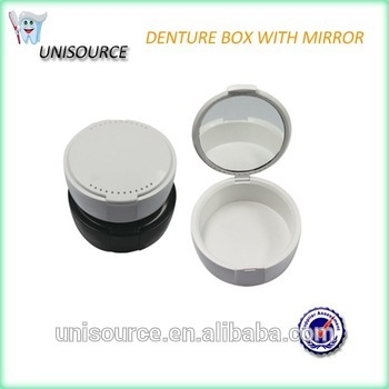 Denture placed holder with mirror