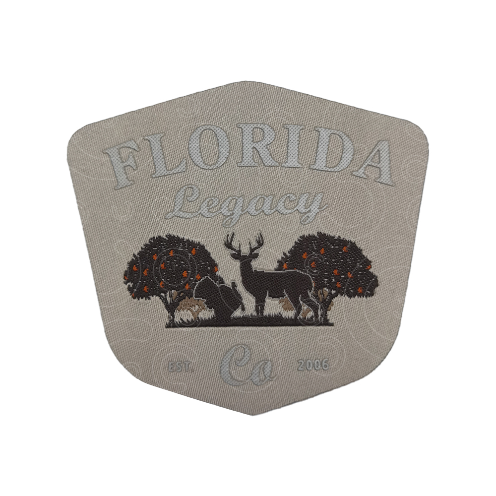 Silver silicone label printed on woven layer