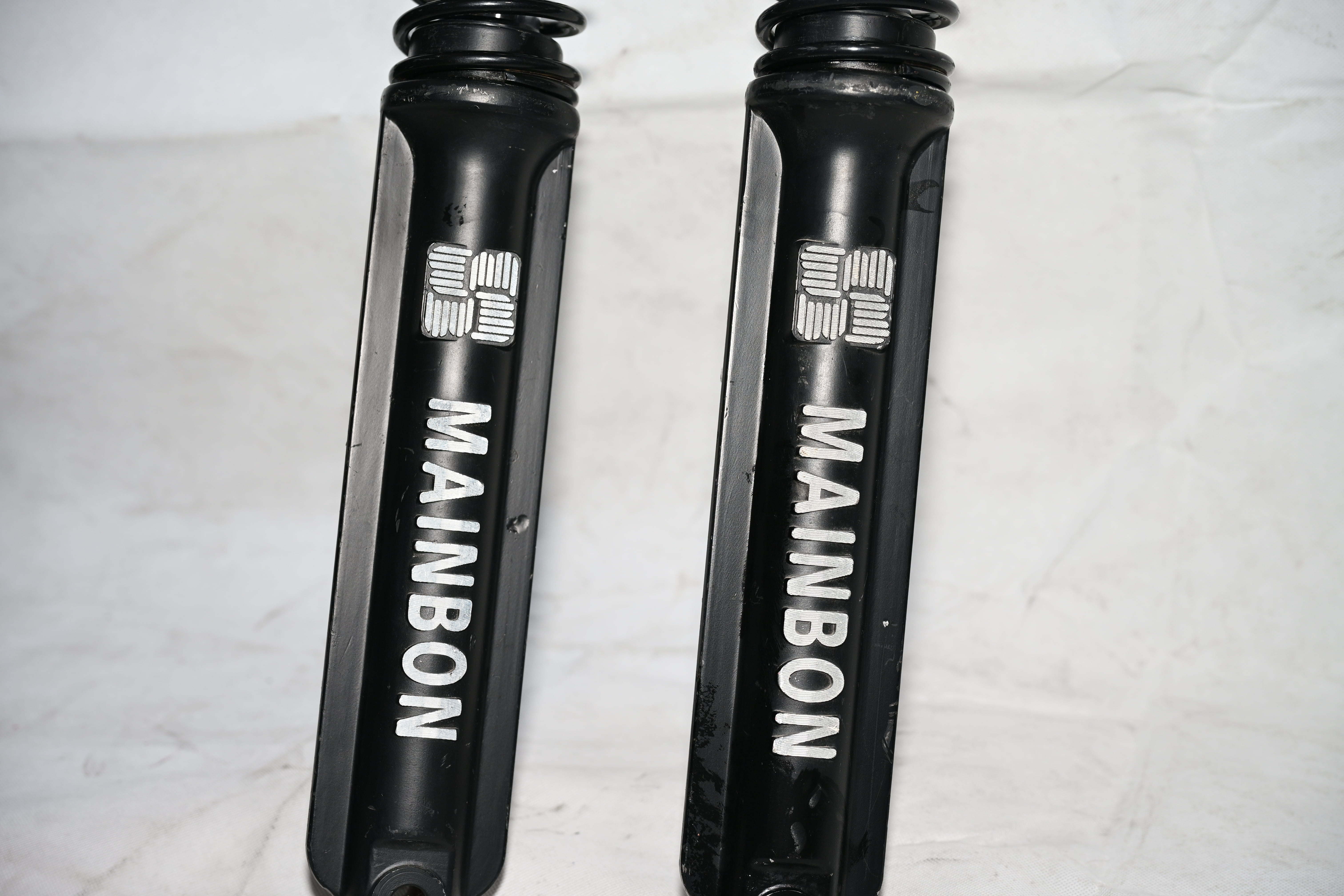 External spring shock absorber