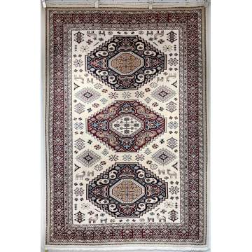 Красный симметричный пакистанский ковер