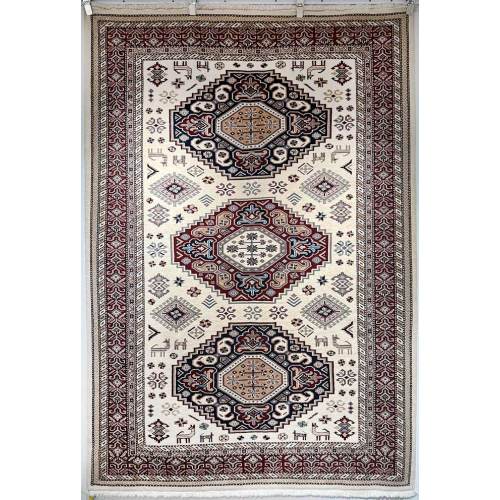 Красный симметричный пакистанский ковер