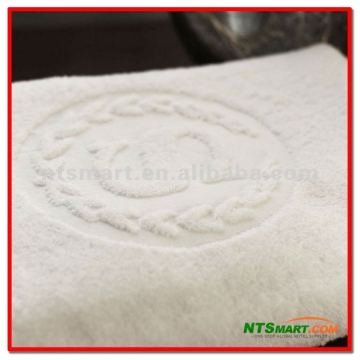 100% cotton jacquard towel with embroidered logo
