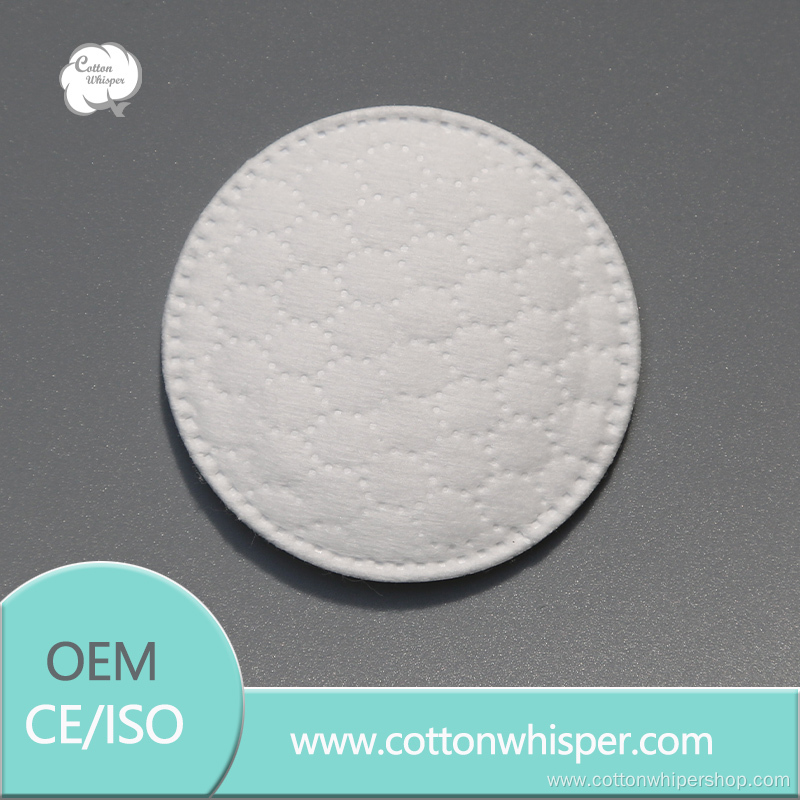 small sun-embossed round cotton pad