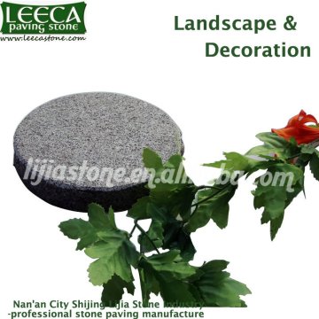 Grey round paving stone