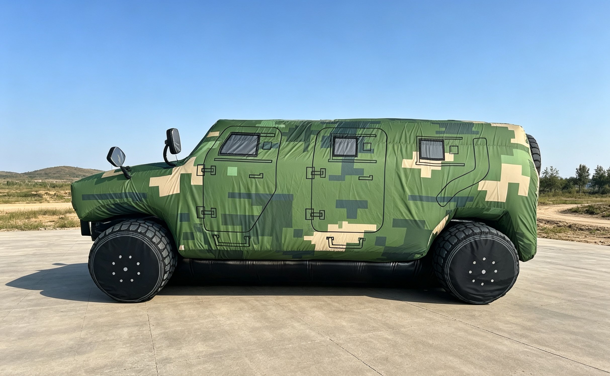 Inflatable military Humvee decoy in digital camouflage