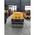 Small ride-on mechanical road roller