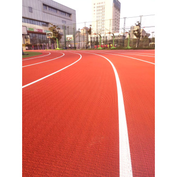 Pista sintética com textura de grão de milho para estádios