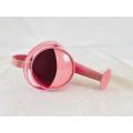 Pink metal kids watering can