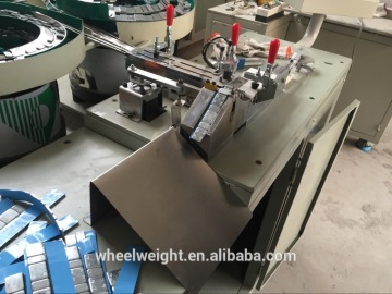 Automatic Tape Pasting and Box Packing Machine / Adhesive Wheel Weight Machine