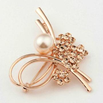 Evening party gold brooch with large pearl and CZ diamond