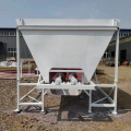 Intermediate buffer silo for the building materials industry