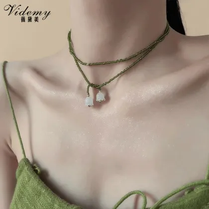 Handcrafted Green Rice Beads with White Lily Pendant