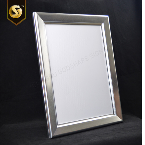 LED illuminated poster holder with clip on frame