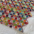 Sulaman ikat pinggang sabuk berwarna -warni pada kain mesh