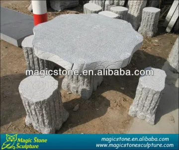 carved stone chess table and benches