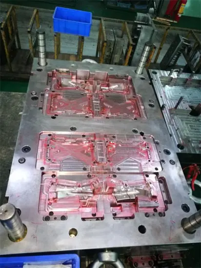 Automotive fitting double shot mold