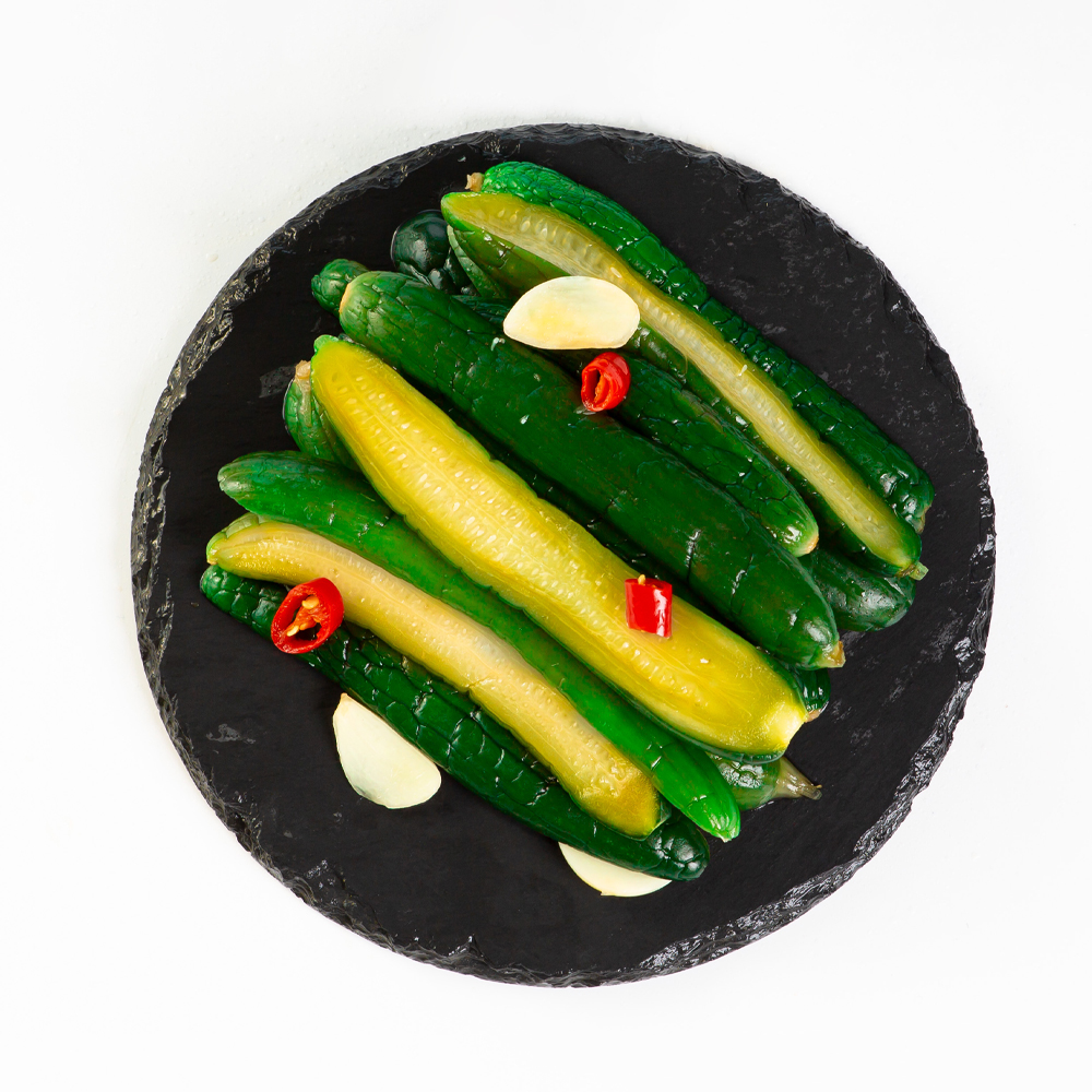 Pickled sweet and sour small cucumbers