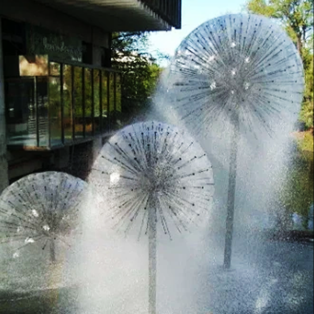 Fonte de água em formato de dente de leão