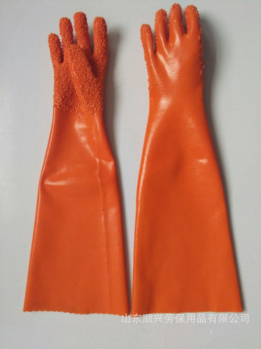 Pomarańczowa rękawica pokryta ramami PVC