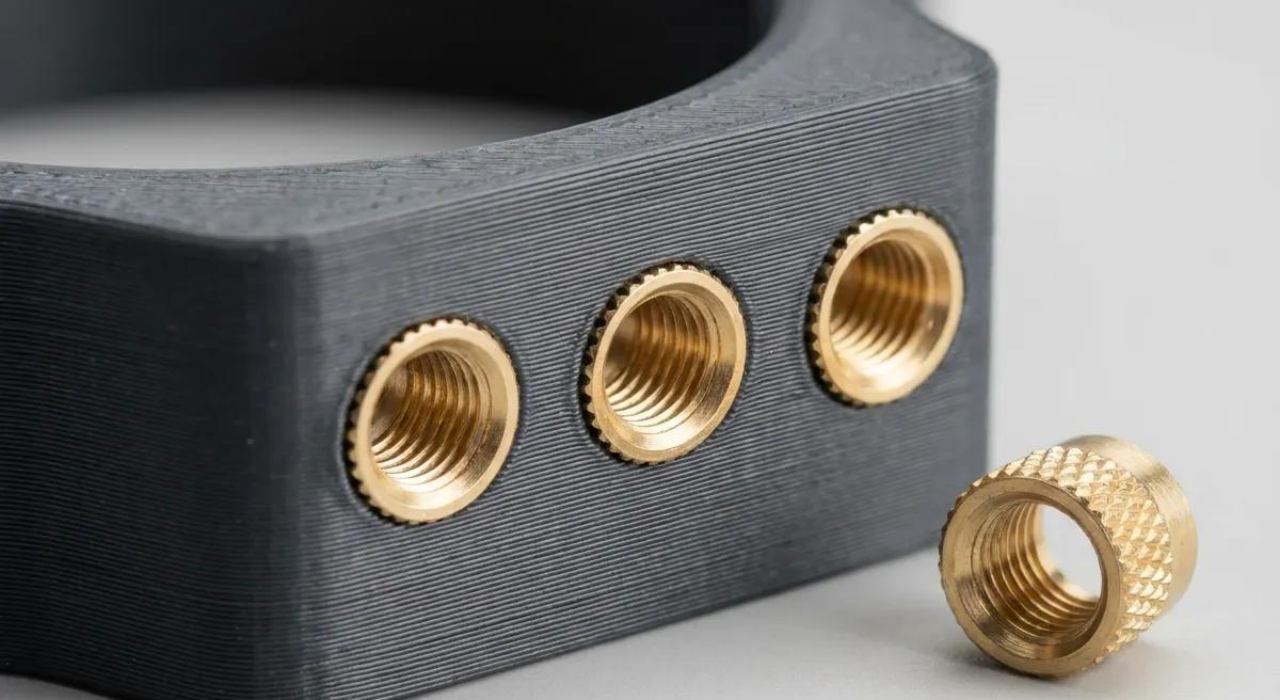 3D printed parts with metal inserts