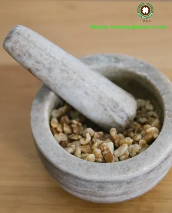 A bite of walnut kernels light pieces