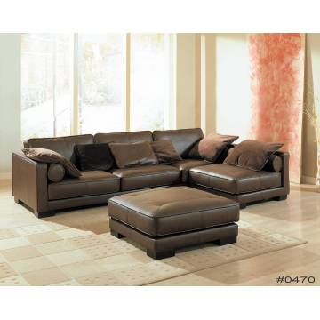 Luxueux canapé sectionnel en cuir brun avec chaise