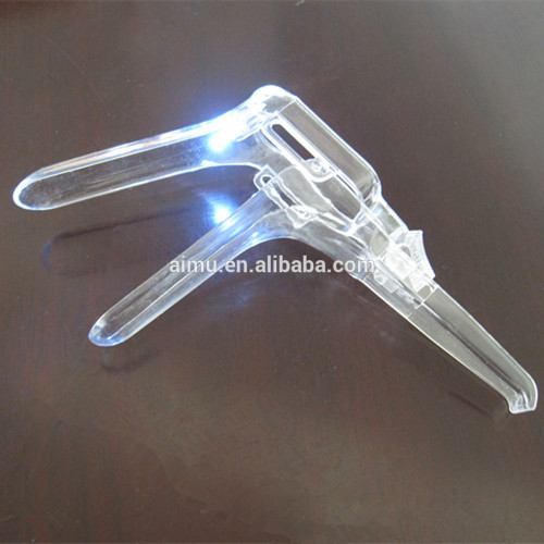 push-pull type disposable vaginal speculum with light source