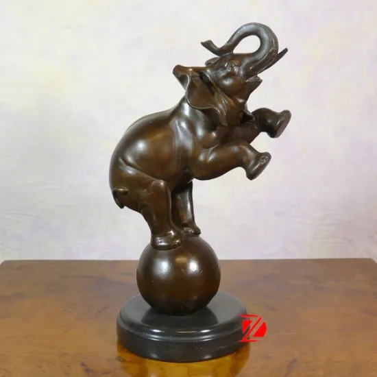 brass playing elephant statue stand for ball