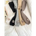 Calça com fundo de nove pontas com laço fofo e veludo grosso
